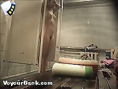 12 movies - Young slim doll getting spied after in the showers Part 1