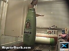 12 movies - Young slim doll getting spied after in the showers Part 1