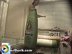 12 movies - Young slim doll getting spied after in the showers Part 1