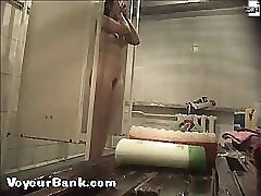 12 movies - Young slim doll getting spied after in the showers Part 1